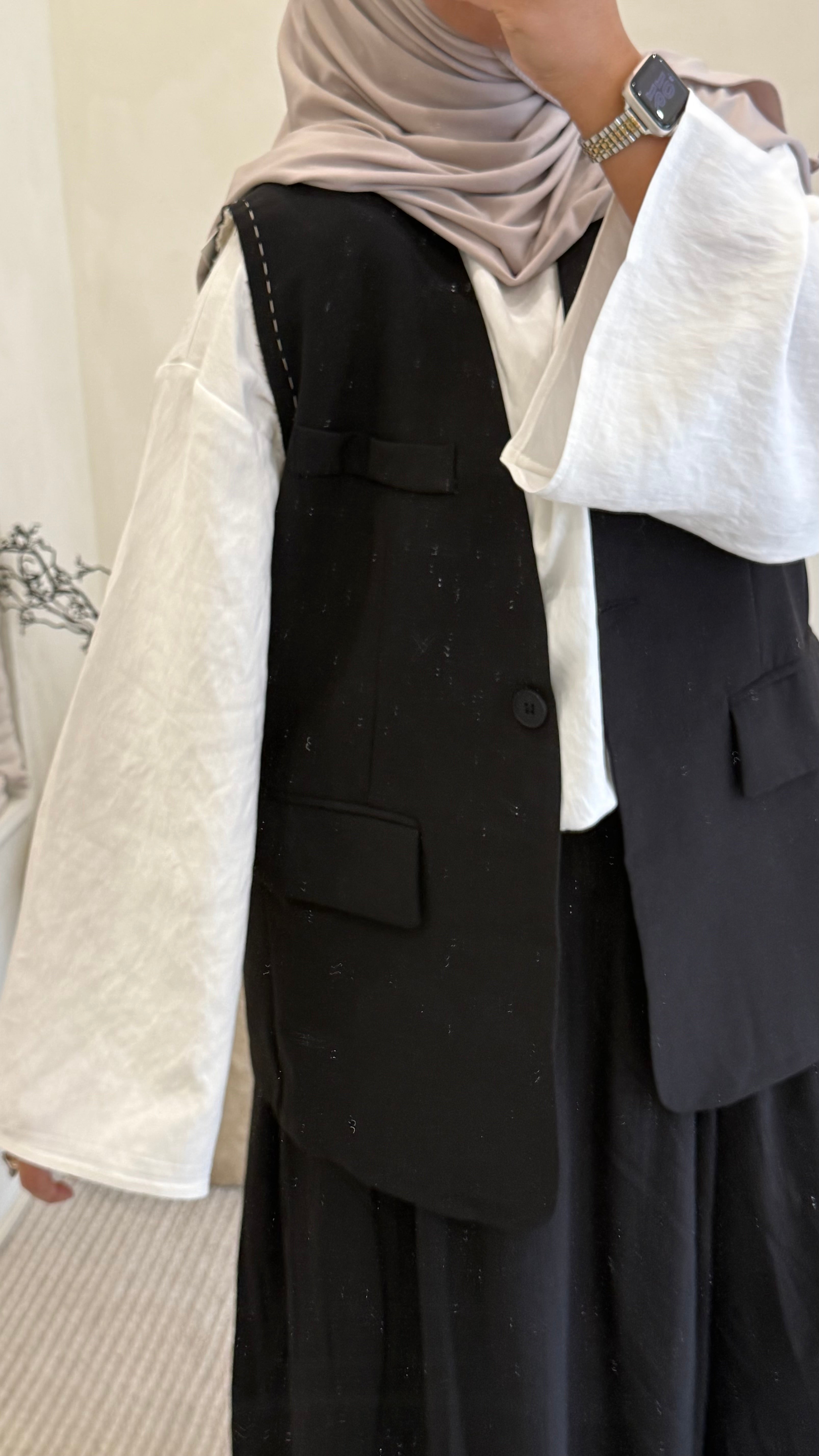 Blazer sans manche noir surpiqûre beige